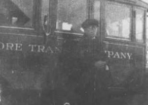 Bus and driver, "Baltimore Transit Company," served Prince Frederick - Baltimore.
