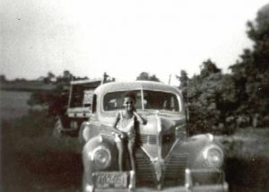 1930-1939 Child on an old car, Mutual