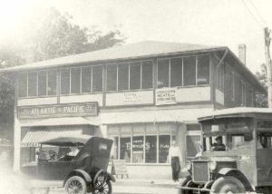 1920-1929 Ewald's Grocery and A&P at 7th and Bay Ave. Bus to Chesapeake Beach rounding corner, North Beach.
