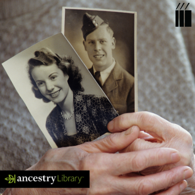 aged hands hold vintage photos
